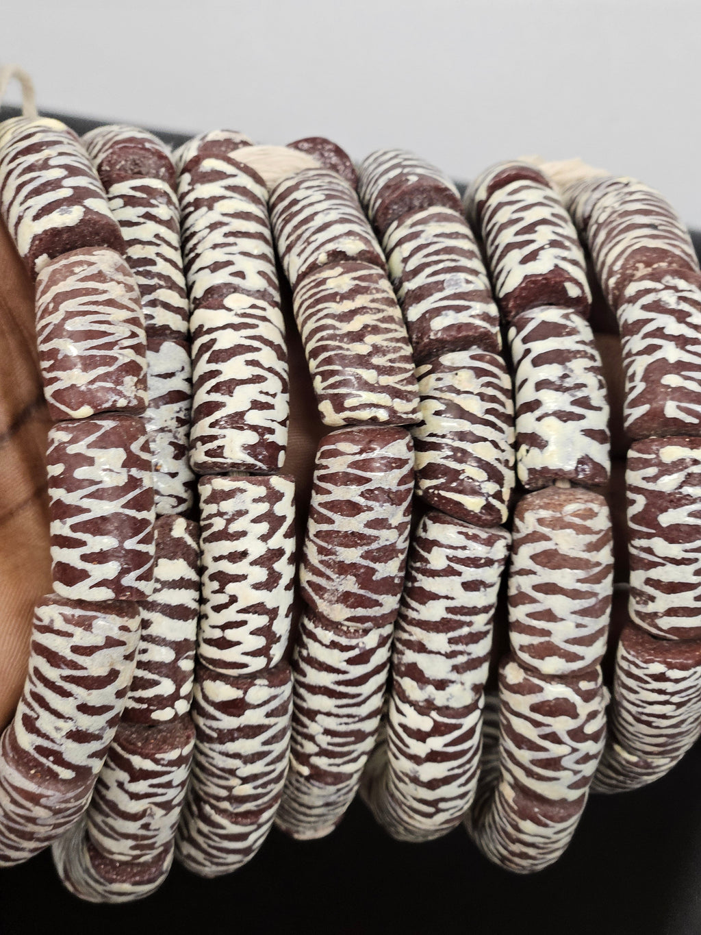 krobo painted recycled glass beads brown cream zigzag patterns