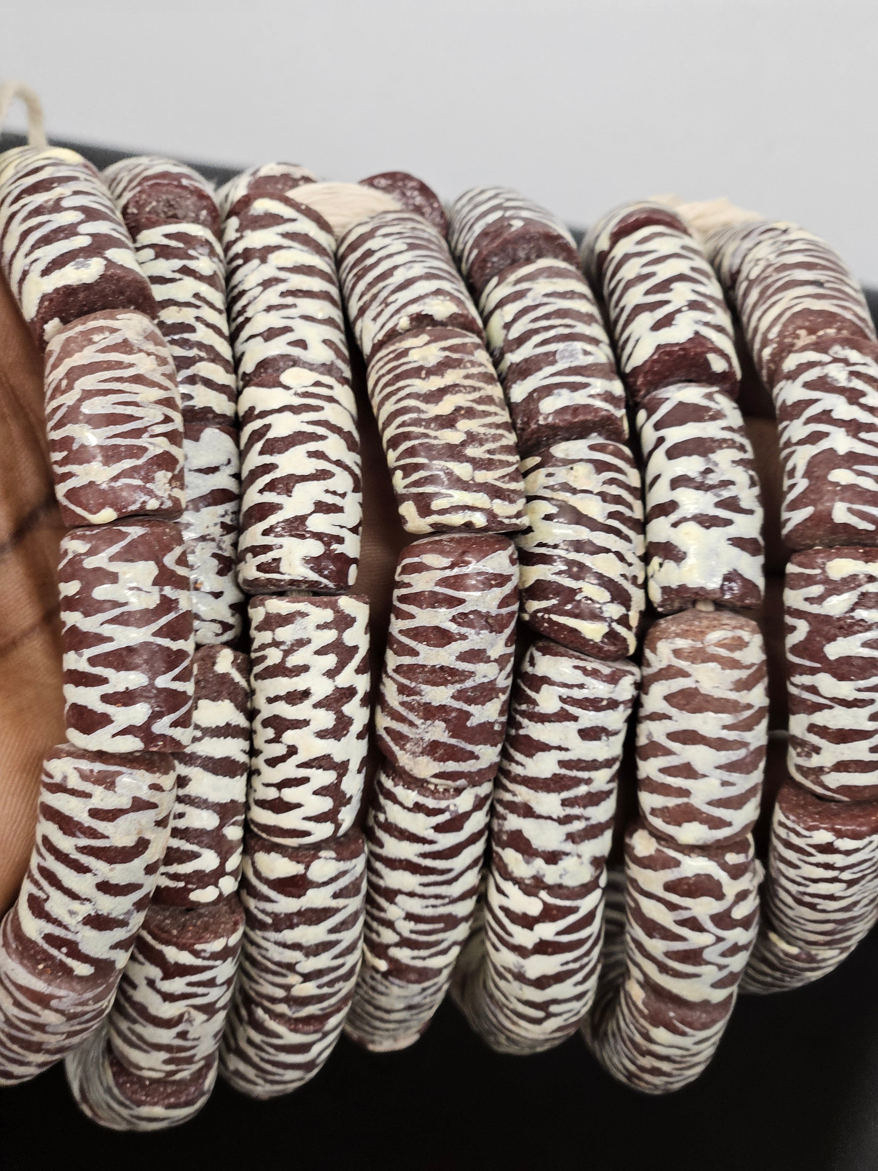 krobo painted recycled glass beads brown cream zigzag patterns