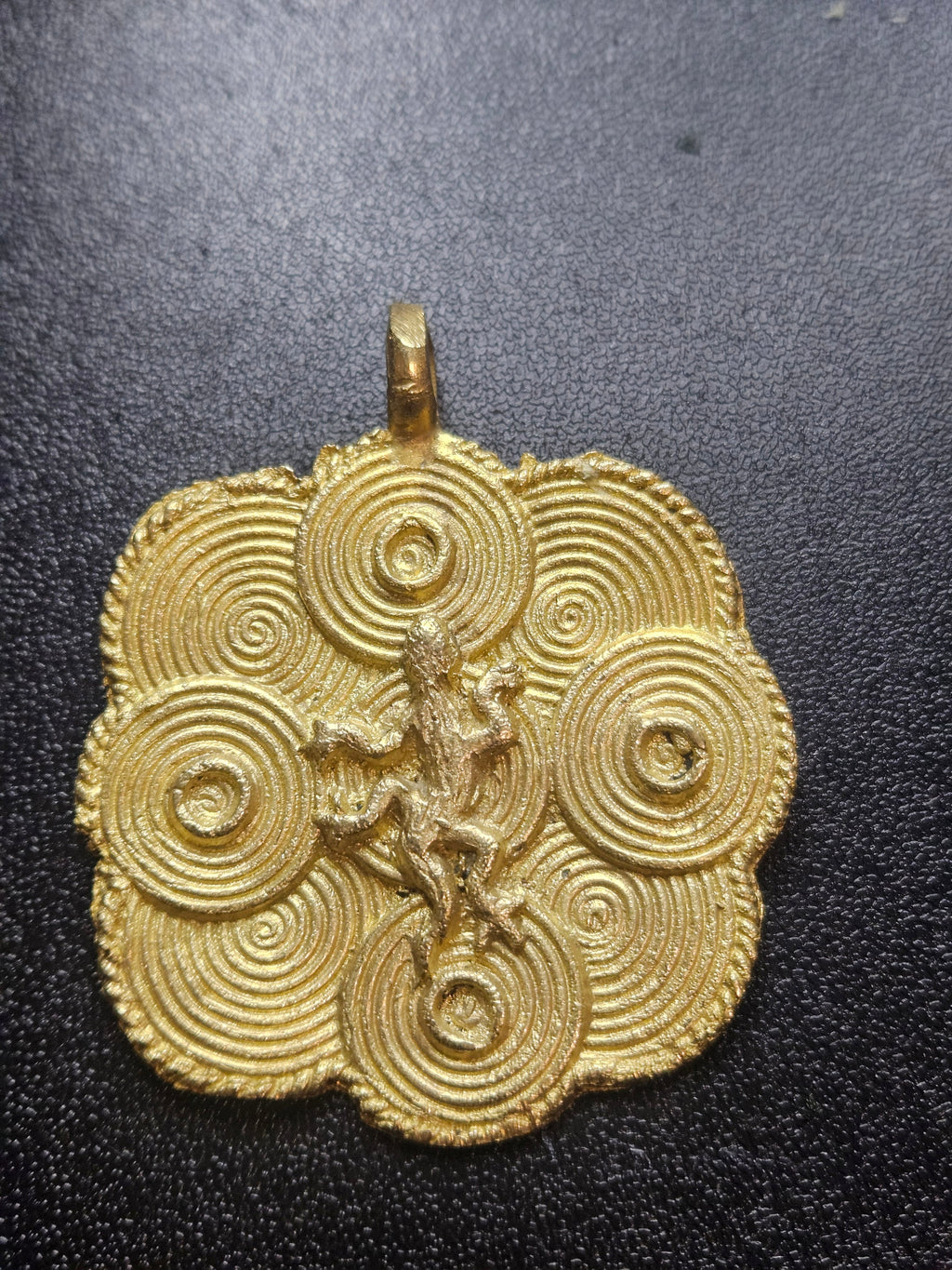 ashanti brass adinkra pendant ghanaian artisan front view