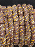 krobo painted recycled glass beads brown white yellow patterns